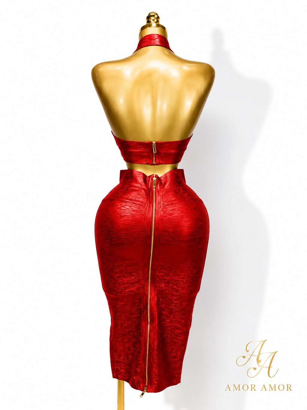 CONJUNTO EFECTO BRONCEADO 
TELA TIPO FAJA, AJUSTADO, ZIPER REFORZADOS