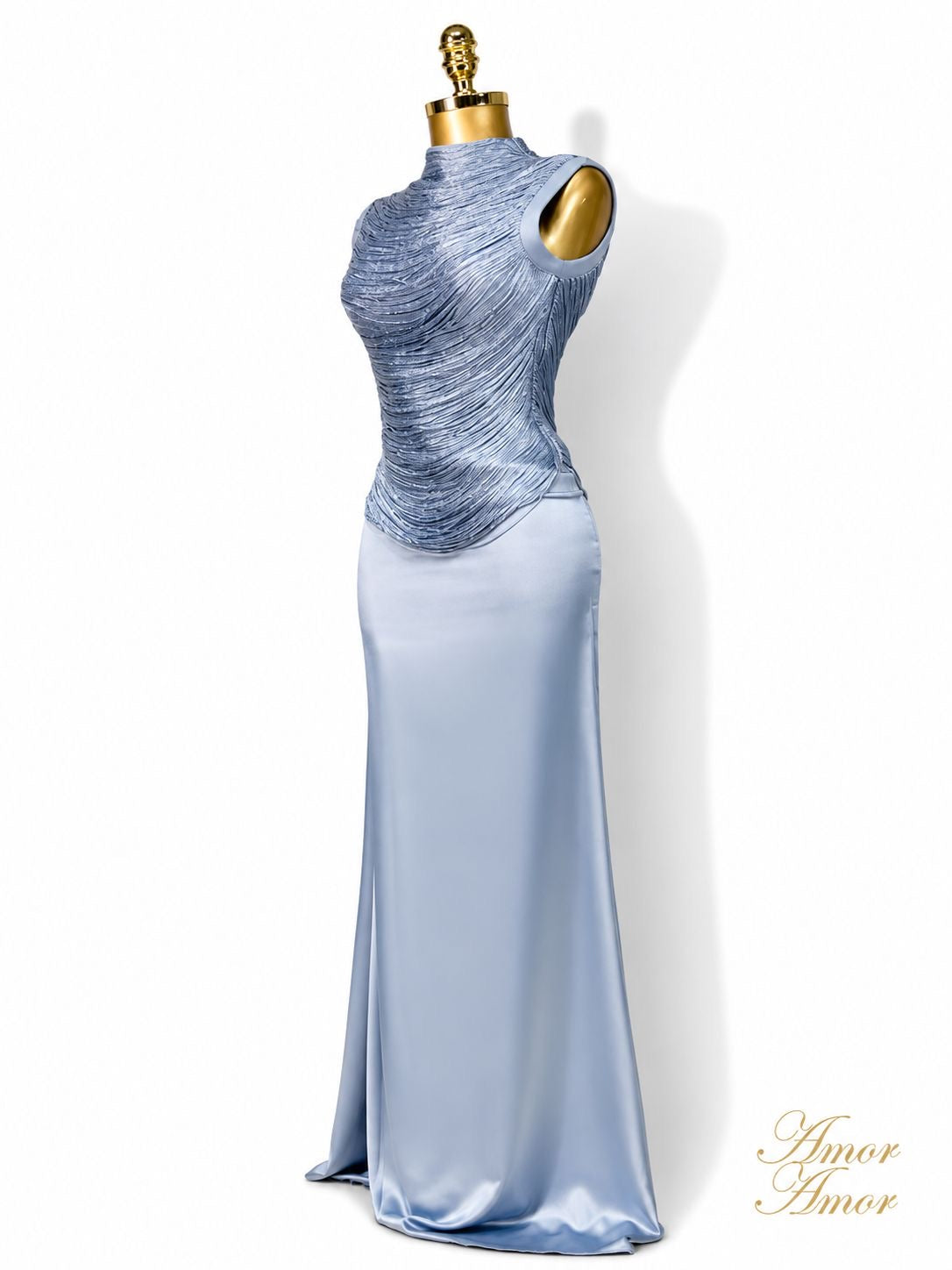 CONJUNTO FALDA LARGA, CINTURA ALTA, TOP BANDAGE DECORADO. ZIPER EN AMBAS PIEZAS