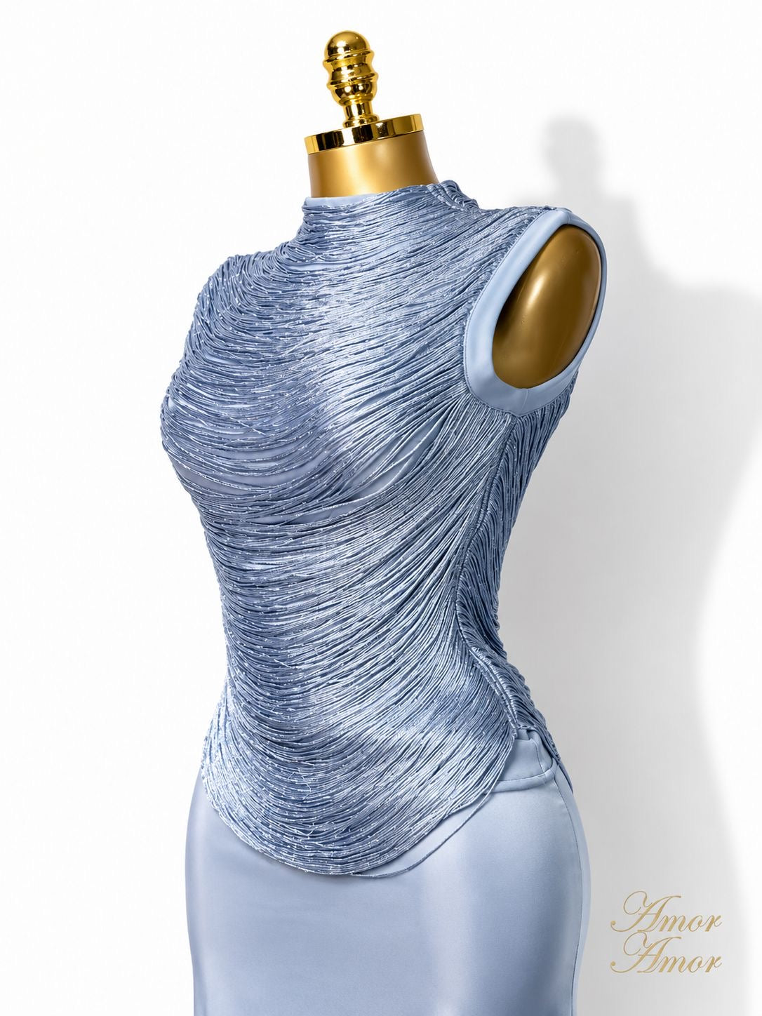CONJUNTO FALDA LARGA, CINTURA ALTA, TOP BANDAGE DECORADO. ZIPER EN AMBAS PIEZAS